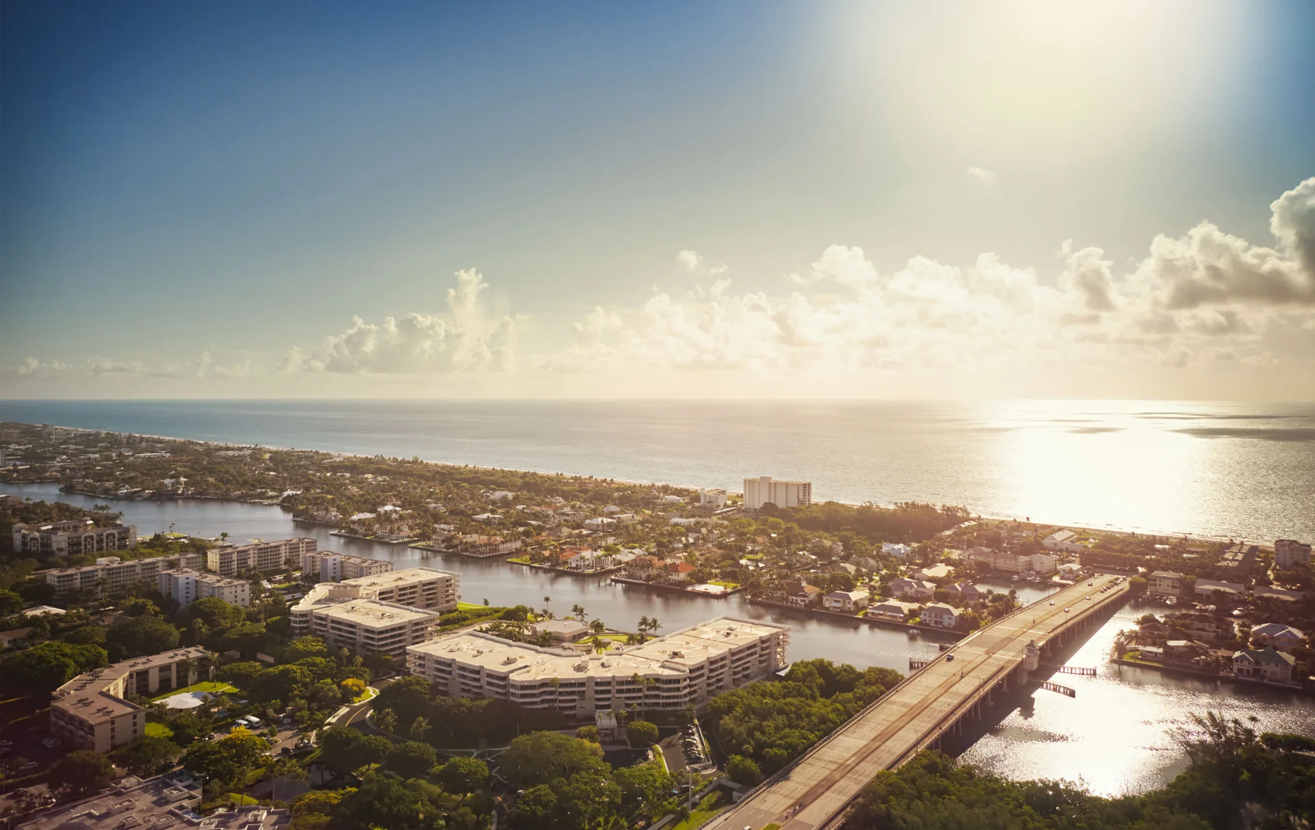 elevated, panoramic of Harbour's Edge Senior Living Community in Delray Beach, FL, pressed against the water at Delray Beach, FL