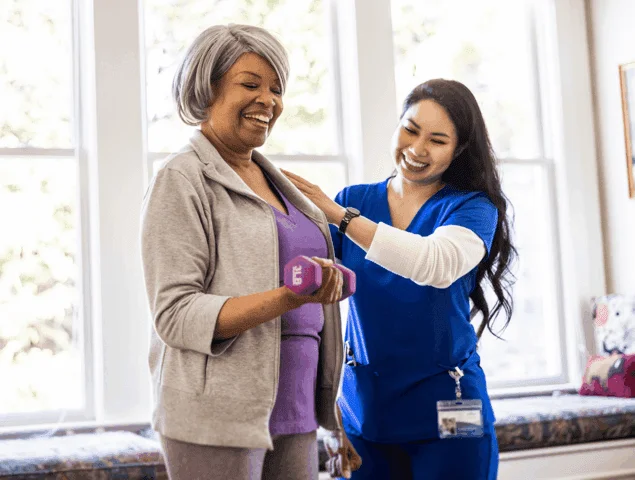 Rehab specialist working with a resident