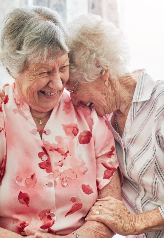 two women laughing