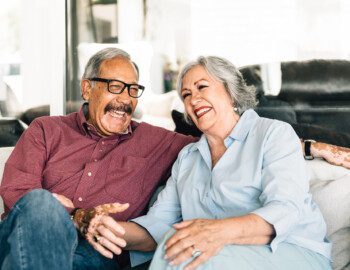 Senior couple enjoying time together on the porch Senior couple enjoying time together on the porch