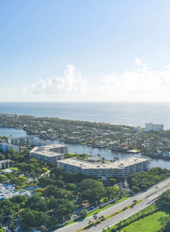 aerial view of Harbour's Edge Senior Living Community, pressed against the harbor and ocean waters in Delray Beach, FL