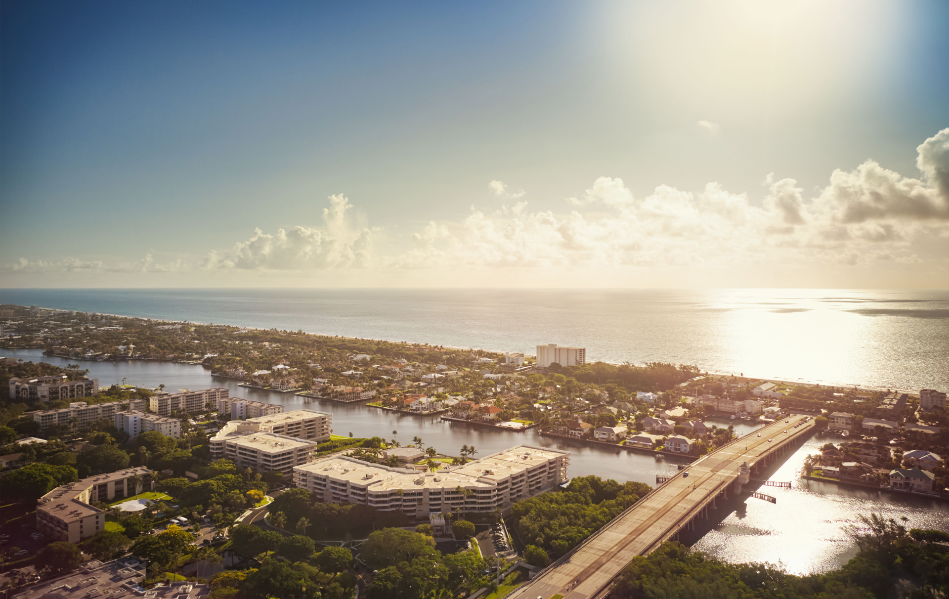 elevated, panoramic of Harbour's Edge Senior Living Community in Delray Beach, FL, pressed against the water at Delray Beach, FL