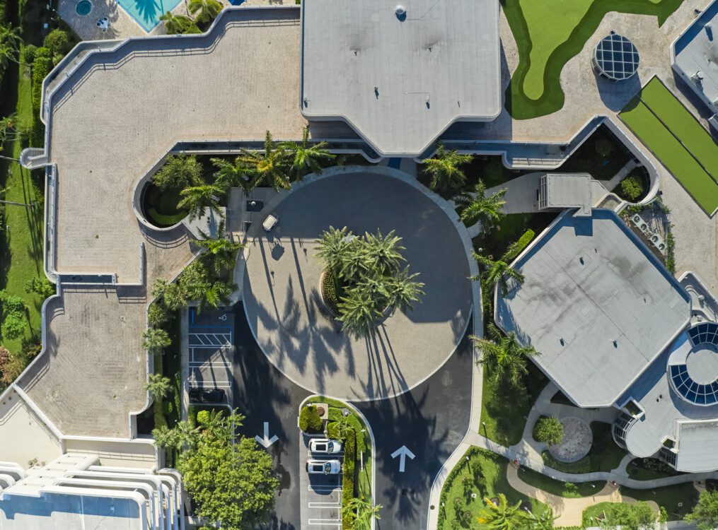 aerial view of roundabout and entrance at Harbour's Edge Senior Living Community in Delray Beach, FL